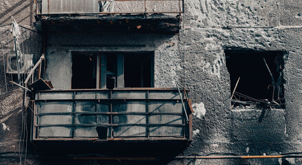 destroyed and burned houses in the city during the war in Ukraine