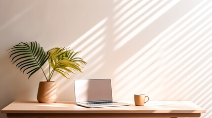 Desktop with laptop, coffee cup and flowerpot with palm tree against a light wall with morning light. The concept of a cozy home office in a Scandinavian style. Generated AI