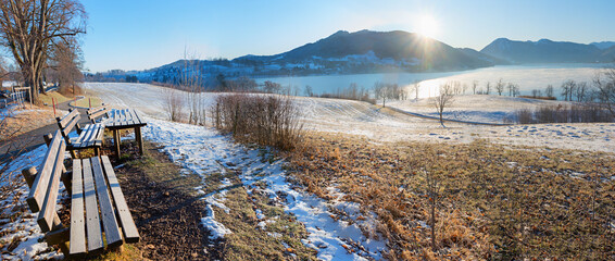 frozen lake Tegernsee and bavarian mountains, tourist resort Grmund, view from lookout place
