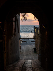 Sunset on Akko seaside boardwalk