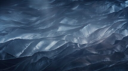 Obraz premium A View of a Mountain Range From a Plane Window