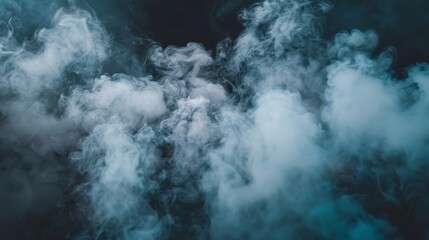 Thick gray smoke swirls and rises in intricate patterns