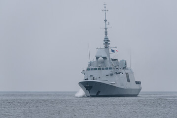 
WARSHIP - A modern French Navy frigate sails on the sea 
