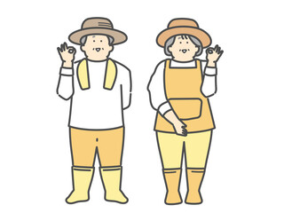 農家で働く笑顔な高齢夫婦　OKポーズ