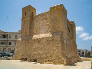 St Paul's Bay, Malta - June 7th 2018: The Wignacourt Tower also known as St. Paul's Bay Tower was the first of six Wignacourt towers built in Malta and was completed in 1610.