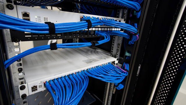 Firewall and Network Cables on a Server Rack Cabinet
