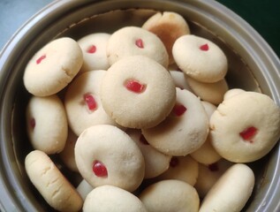 Nankhatai are shortbread biscuits originating from the Gujarat region of India. The word nankhatai is derived from the Persian word naan meaning bread and khatai from a Persian word meaning biscuit. 