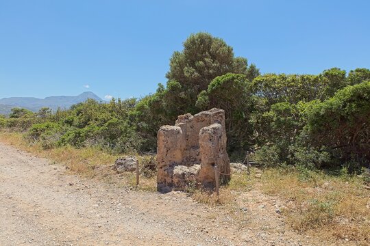 Poseidon&acute;s Throne located near Ancient City of Phalasarna in clear spring weather, Falasarna, Crete, Greece.