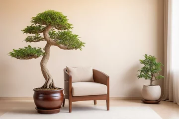 Foto auf Acrylglas Stylish armchair and bonsai tree in wooden pot. Interior design of modern living room with beige stucco wall with empty copy space © Giuseppe Cammino