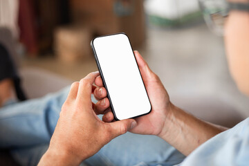 cell phone blank white screen mockup.hand holding texting using mobile on desk at office.background empty space for advertise.work people contact marketing business,technology