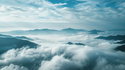 Obraz premium Above clouds view of mountain ranges