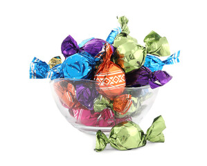 Bowl with sweet candies in colorful wrappers on white background