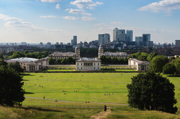 London, England, Panoramic View Of Greenwich and Canary Wharf With Blue Sky And Clouds