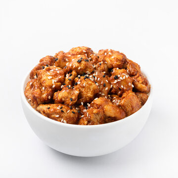 Sweet and Sour Chicken on a white background close-up