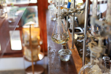 selective focus glass jar for liquid distillation equipment In the refreshing drink shop Use scientific experiment equipment to make drinks for sale.