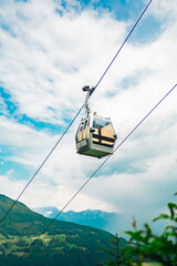 Cabin of a Cable Car Descending Down the Mountain
