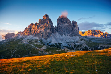 Famous rocky massif Tre Cime di Lavaredo. Italian Alps, South Tyrol, Europe. - obrazy, fototapety, plakaty