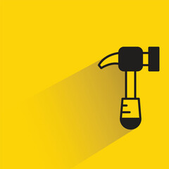 hammer icon with shadow on yellow background
