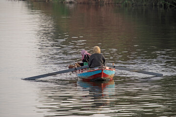 Fototapeta na wymiar Traditional egyptian bedouin fisherman on river