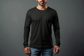 Man wearing black long-sleeved t-shirt. close up, front view. Blank mockup for design presentation