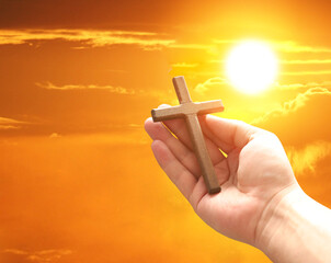 Cross in arm at sunset. Good Friday concept. 3d illustration