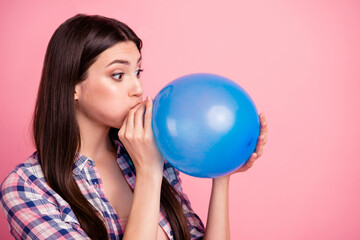 Naklejka premium Close-up profile side view portrait of nice attractive cute charming lovely funny straight-haired lady wearing checked shirt blowing air ball isolated over pink background