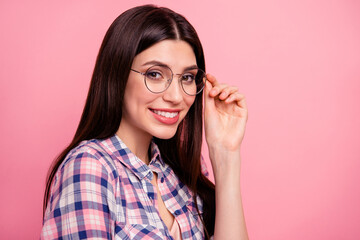 Close up side profile photo funky funny amazing her she lady hold arm hand cool specs look sincerely kindhearted candid eyes wear casual checkered plaid shirt clothes outfit isolated pink background