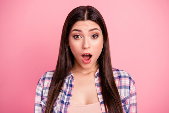 Close up photo amazing beautiful her she lady perfect brown big eyes long straight hair opened mouth wondered ecstatic wear casual checkered plaid shirt clothes outfit isolated pink bright background