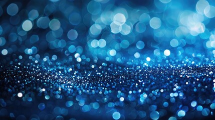 background of abstract blue and silver glitter lights. defocused