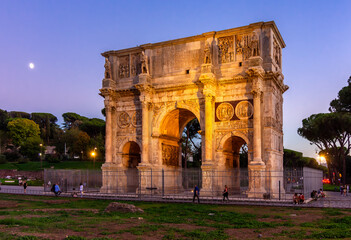Fototapeta na wymiar Arch of Constantine (Arco di Constantino) near Colloseum (Coliseum) at sunset, Rome, Italy