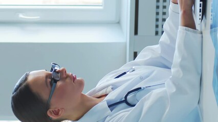 Professional medical doctors working in hospital office making computer research. Medicine, healthcare and technology concept.
