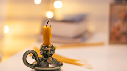 church candle close up bokeh, prayer and lent concept