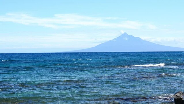 Rishiri Island seen from Rebun Island. The rushing wave.