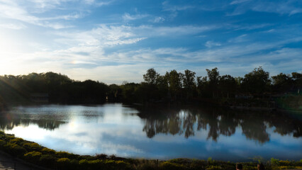 Fototapeta na wymiar Lake in the Tropical Forest Blue Sky Reflection on the Lake