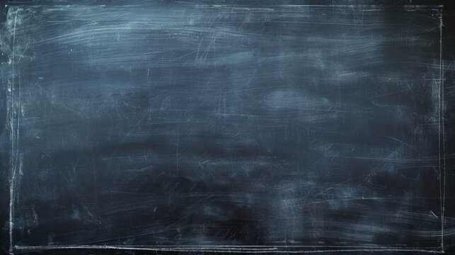 Black slate board wall with chalk stains with empty copy space for text	
