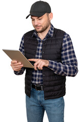 Isolated man wearing casual clothes and cap uses digital tablet. Farmer working digital mobile device.  © Igor Barilo