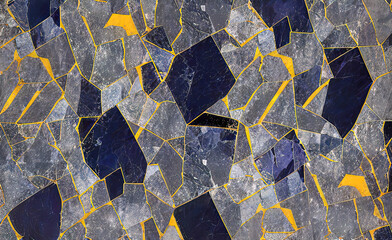 Abstract texture of dark granite stone with refraction interspersed with gray shiny quartzite and gold, background for design,