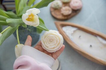 Handmade candles in the shape of flowers