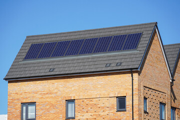 New modern apartment buildings with solar panels on the roof