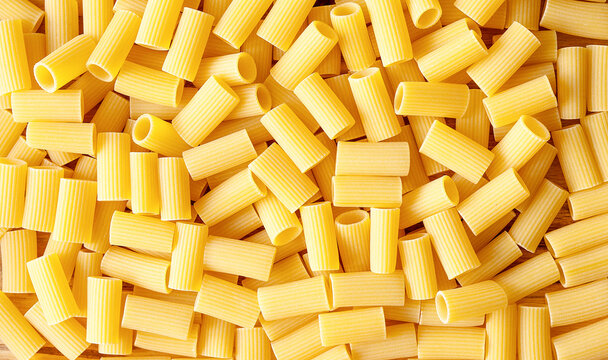 Italian Pasta Tortiglioni background. Closeup of rigatoni pasta
