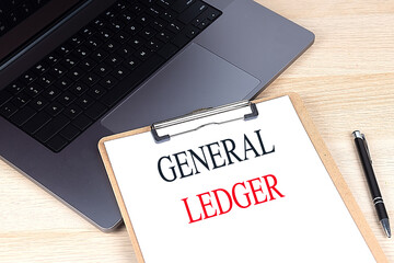 GENERAL LEDGER text on clipboard on laptop
