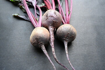 Beetroot on black background. Its other names  beets, table beet, garden beet, red...