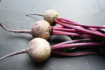 Beetroot on black background. Its other names  beets, table beet, garden beet, red...