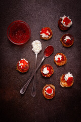 Obraz na płótnie Canvas Demidoff pancakes, mini pancakes, with sour cream and red caviar, crepes. homemade, no people,