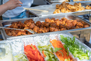 Traditional korean street food at the market. Meat balls for sale.
