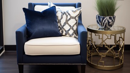 Navy Blue Accent Chair with Cream and Gold Throw Pillows.