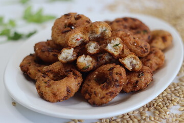 Barley Vada or fritters. Golden fried hulled barley vadas, crispy, healthy, vegetarian snack