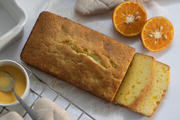 Sliced Loaf of Orange pound cake, also known as citrus loaf cake or orange butter cake