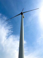 Windmill electric windmill on blue sky background