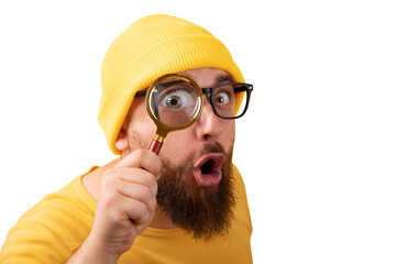 shocked man looking into magnifying glass isolated on transparent background